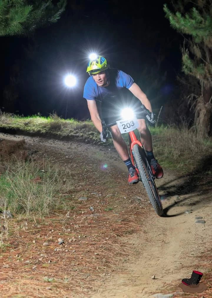 Patrick riding a mountain bike on a forest trail